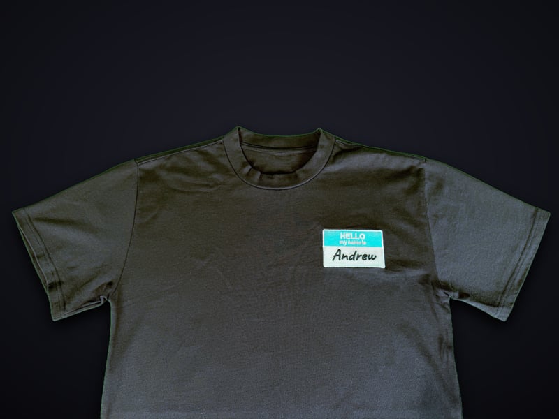 Hello My Name Is -- embroidered nametag tee, front view